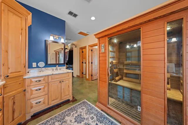 a view of a big house with a big yard