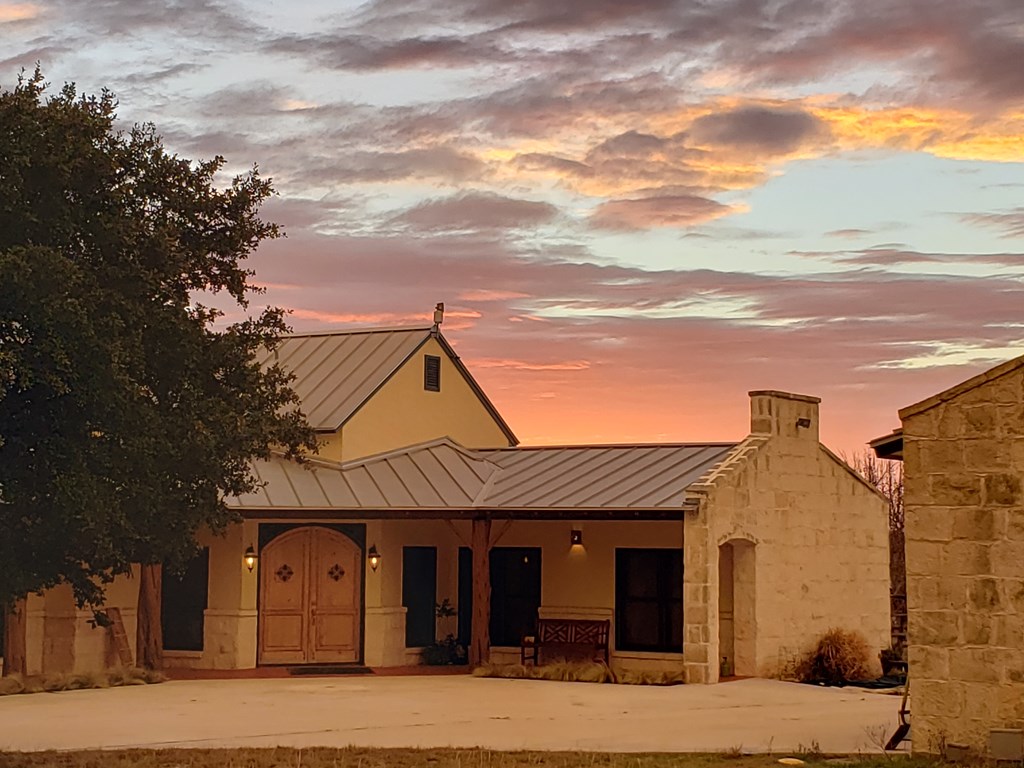2320 Fiedler Road Harper, TX 78631 - Photo 24 of 62 front view of a house with a terrace