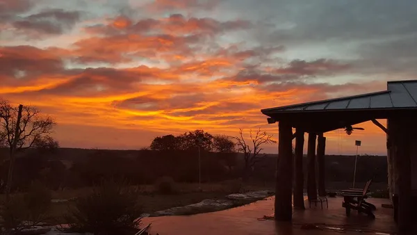 a bathroom with a shower and a sink