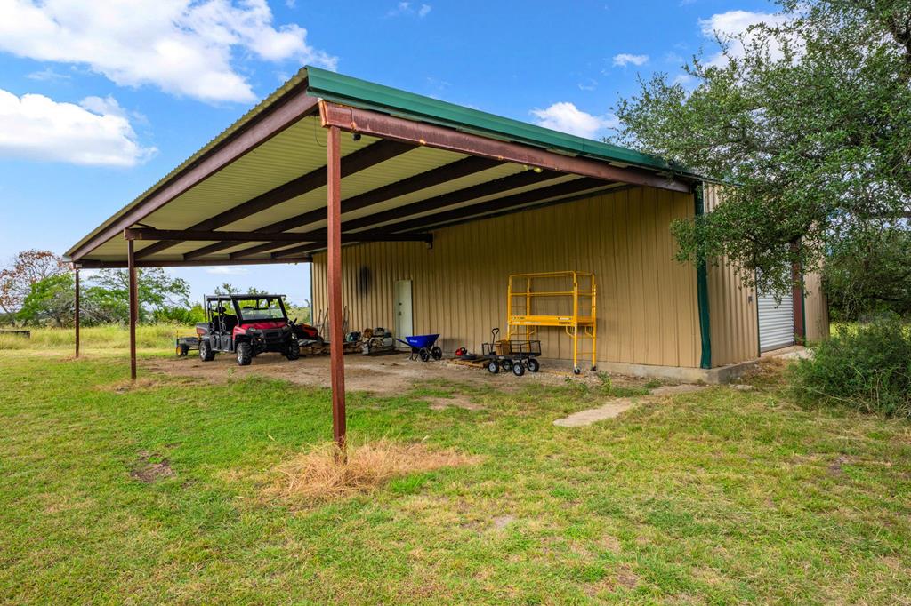 2320 Fiedler Road Harper, TX 78631 - Photo 32 of 62 a view of a house with a yard and sitting area
