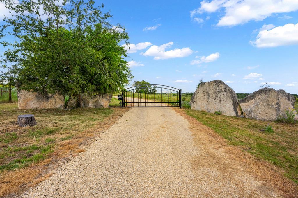 2320 Fiedler Road Harper, TX 78631 - Photo 43 of 62 a view of a yard with table and chairs