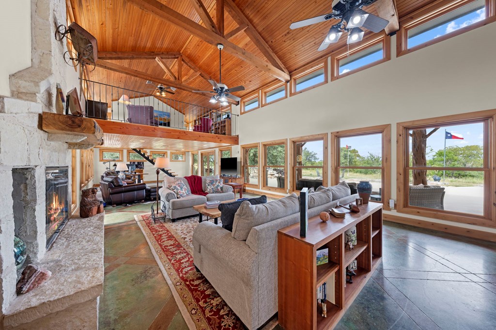 2320 Fiedler Road Harper, TX 78631 - Photo 6 of 62 a living room with furniture and a large window