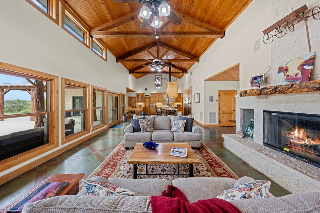2320 Fiedler Road Harper, TX 78631 - Photo 8 of 62 a living room with furniture fireplace and flat screen tv