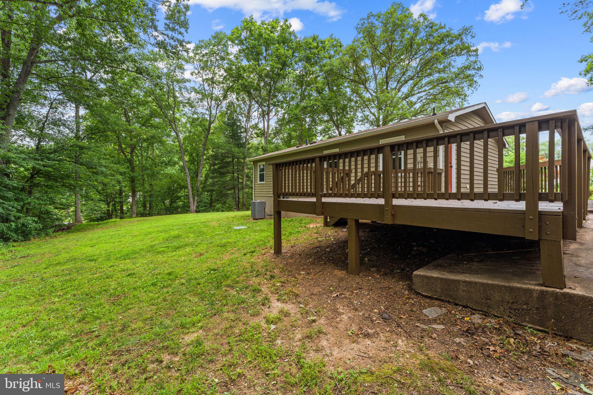 1821 James City Road Reva, VA 22735 - Photo 38 of 44 a view of a wooden bench in a backyard