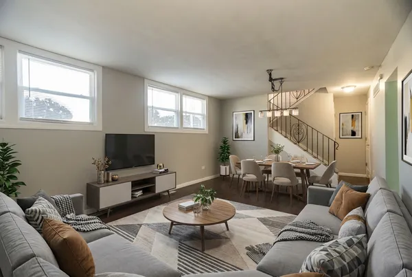 a living room with furniture and a flat screen tv