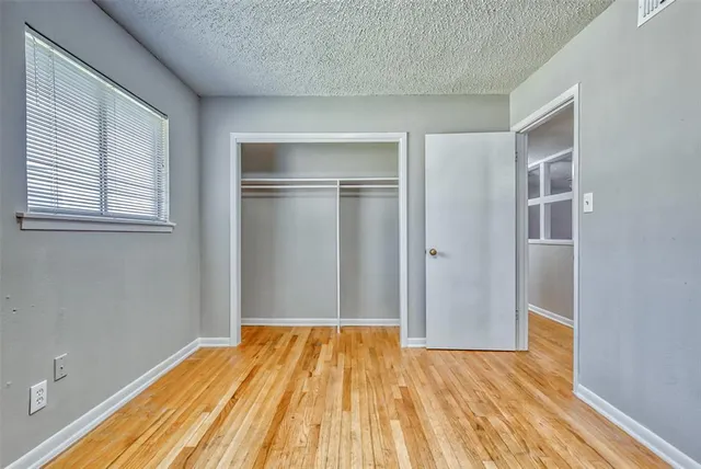 a view of a room with a large window