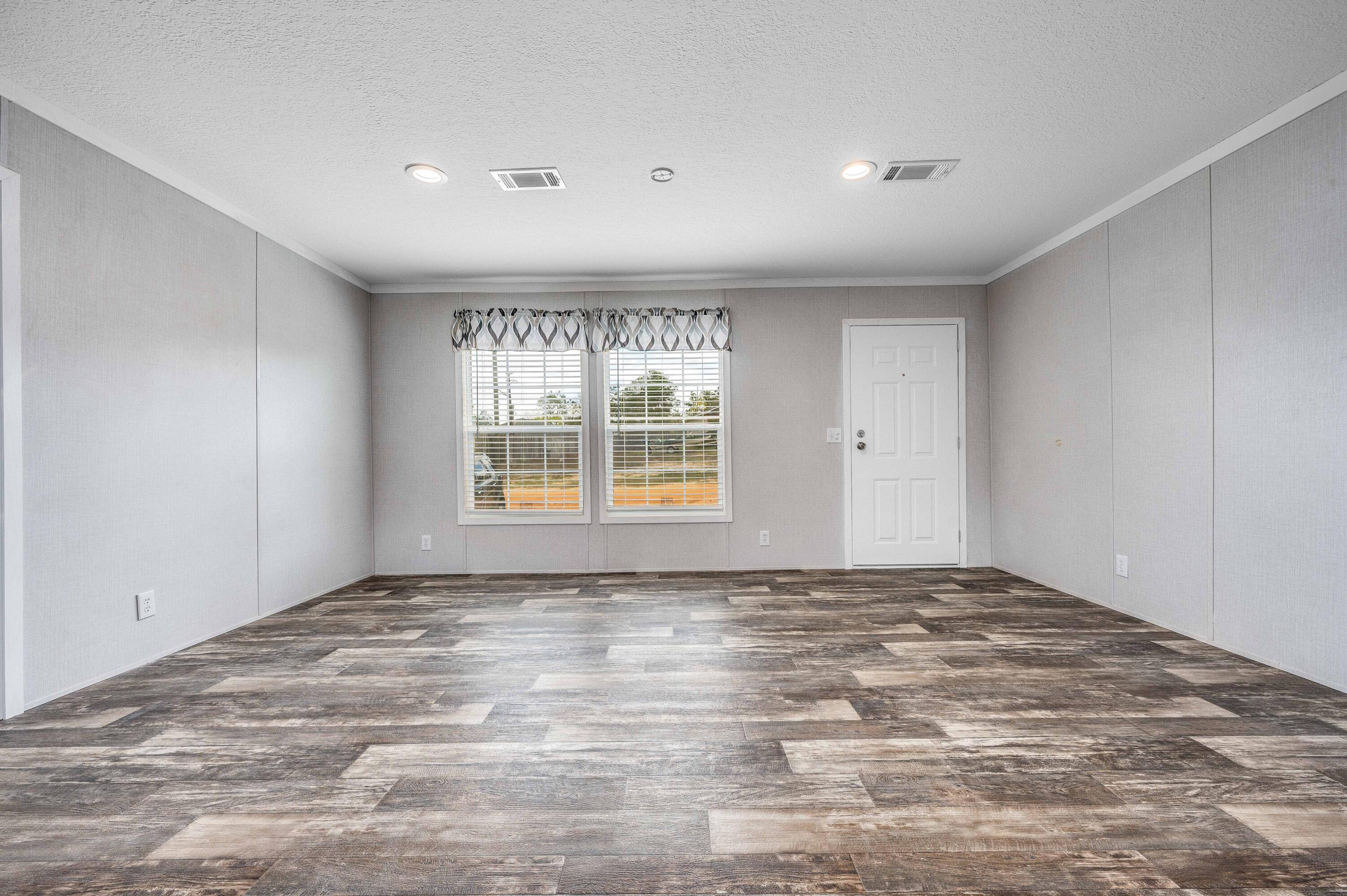 4679 Dove Way Crestview, FL 32539 - Photo 11 of 41 a view of an empty room with a window