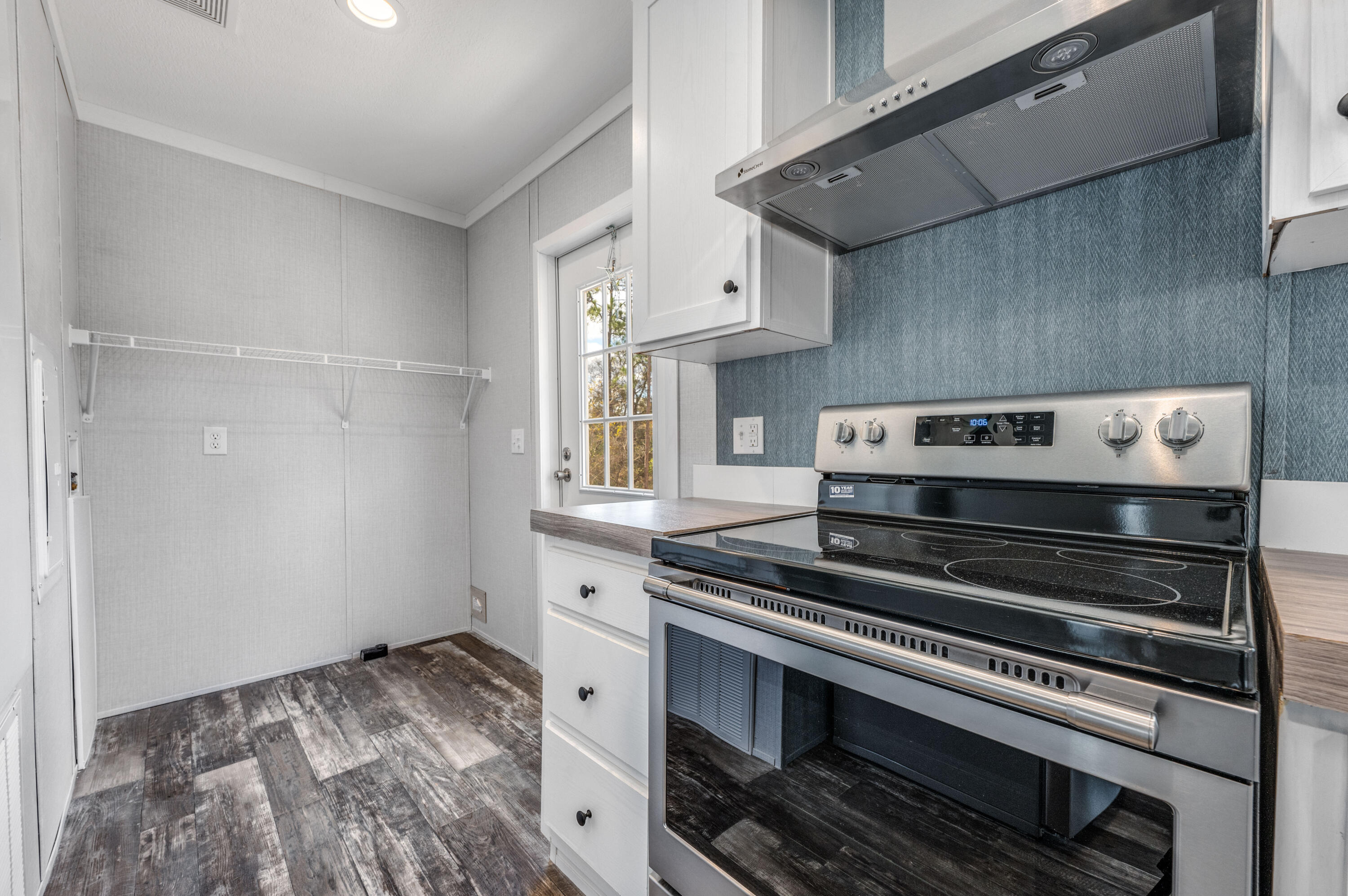 4679 Dove Way Crestview, FL 32539 - Photo 19 of 41 a stove top oven sitting inside of a kitchen