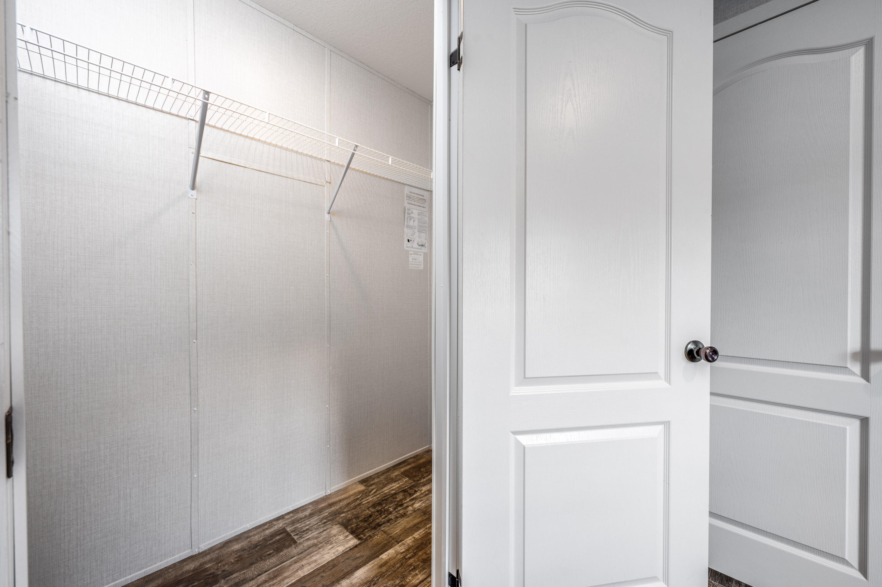 4679 Dove Way Crestview, FL 32539 - Photo 28 of 41 a view of small space with racks on the wall