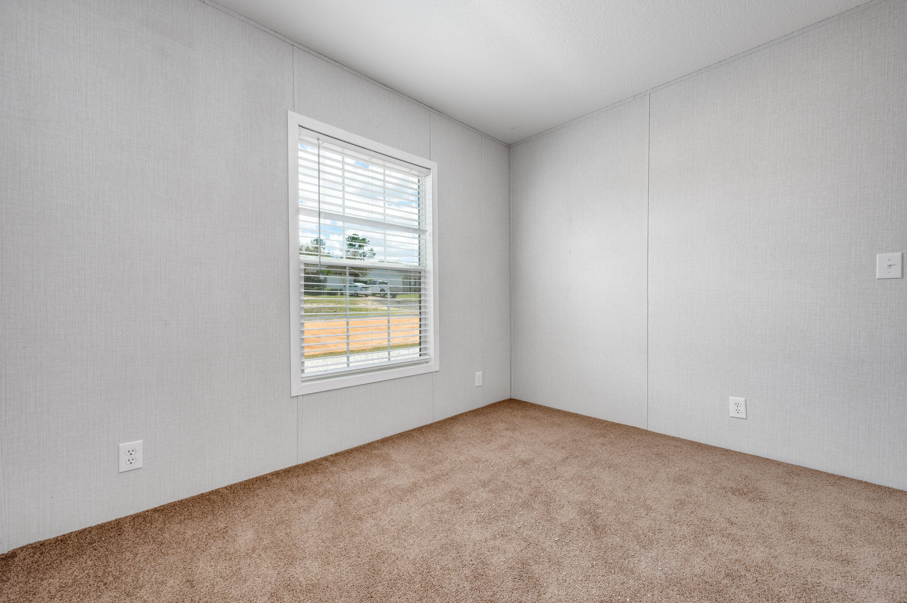 4679 Dove Way Crestview, FL 32539 - Photo 31 of 41 an empty room with a window