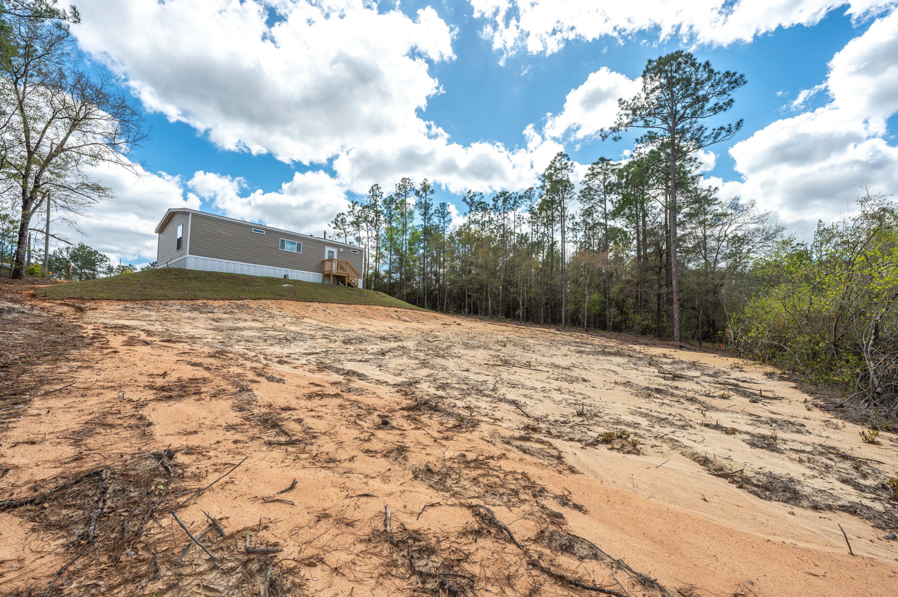 4679 Dove Way Crestview, FL 32539 - Photo 38 of 41 a view of a lake view