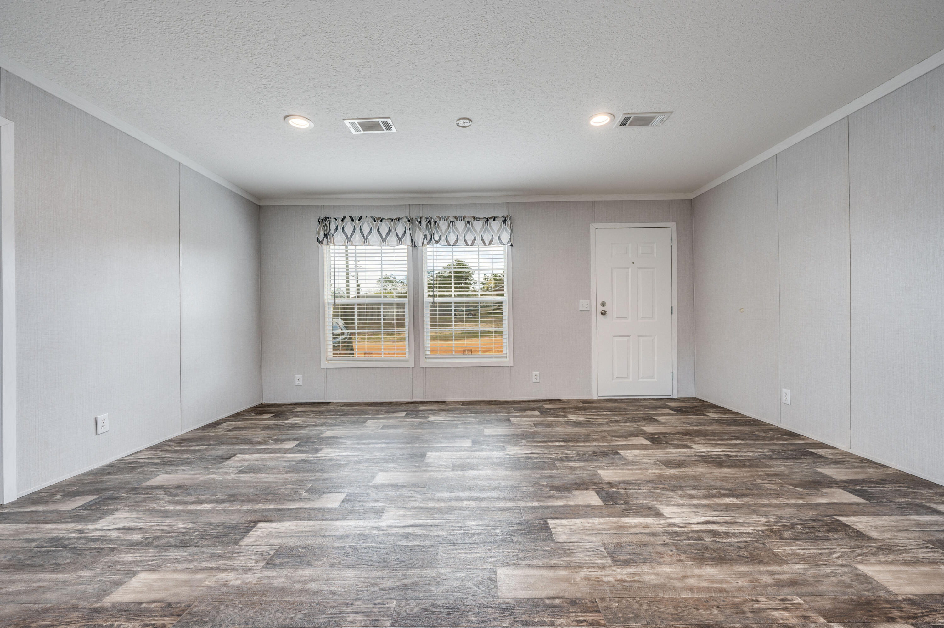 4679 Dove Way Crestview, FL 32539 - Photo 10 of 41 a view of an empty room with a window