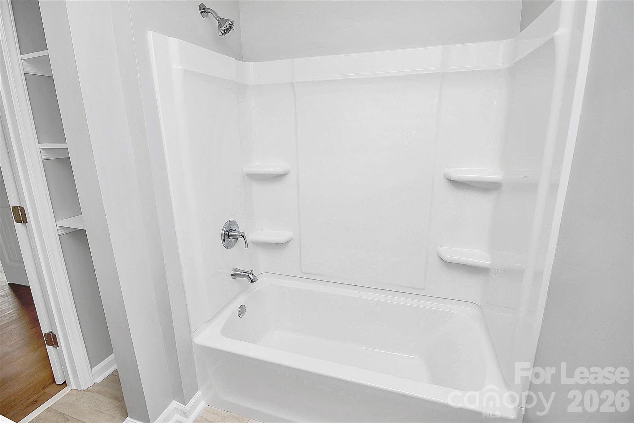 315 South Ransom Street Gastonia, NC 28052 - Photo 14 of 18 a bathroom with a bathtub