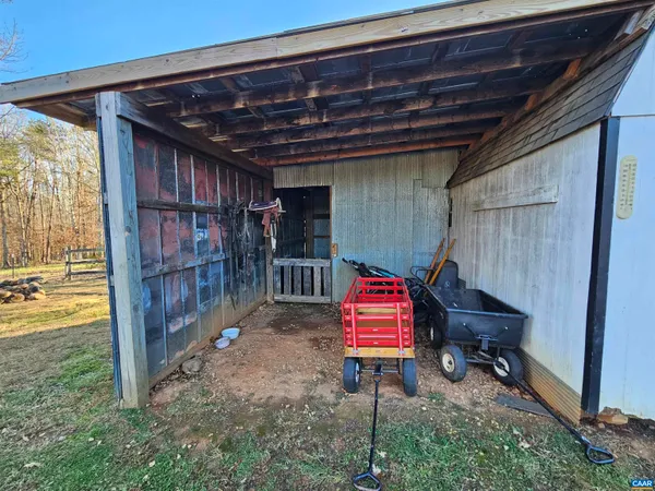 a view of a yard with trees