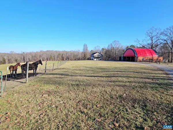 a view of a town with mountains in the background