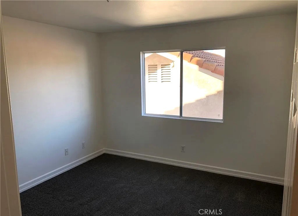 643 Dunkirk Drive Oxnard, CA 93035 - Photo 18 of 18 an empty room with a window