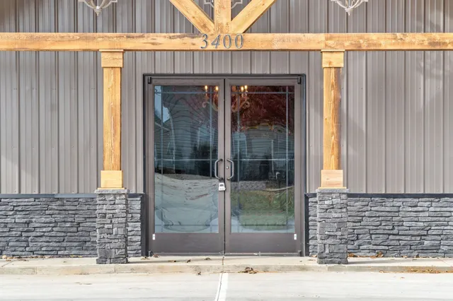 a front view of a house with a glass door