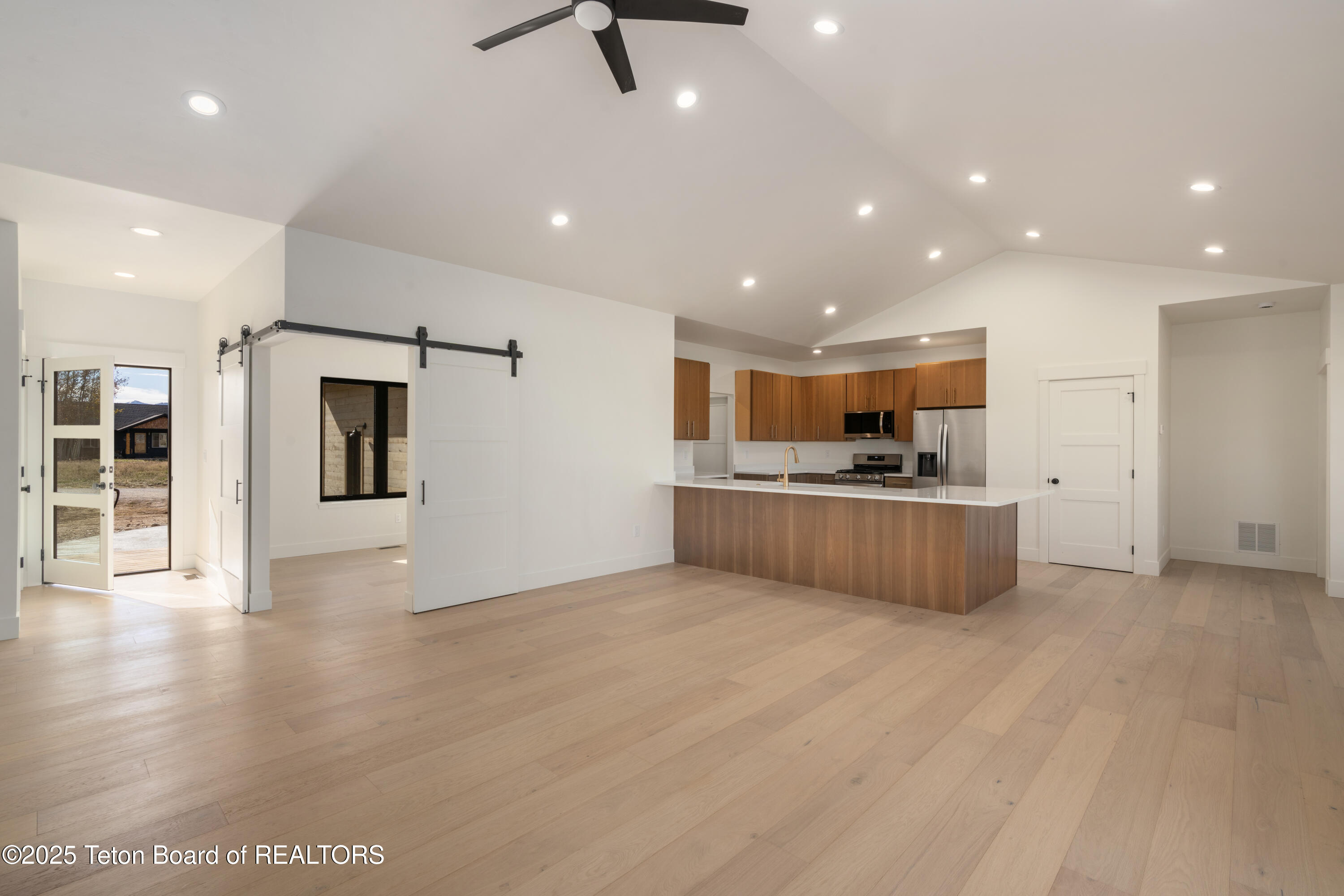 1170 Kayak Loop Victor, ID 83455 - Photo 11 of 41 Kitchen to Home Office and Great Room