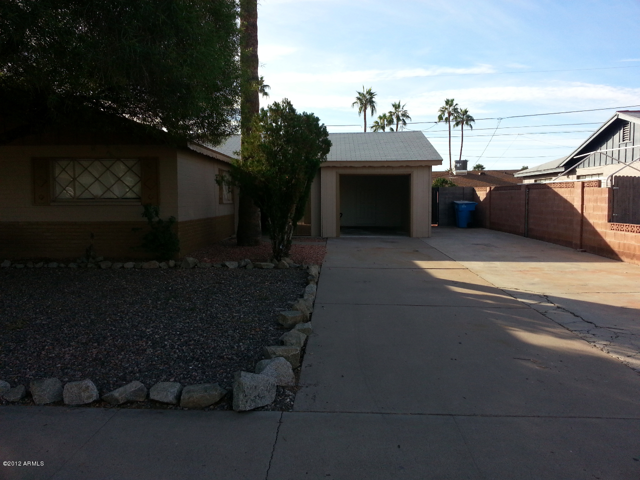 3043 West Bloomfield Road Phoenix, AZ 85029 - Photo 3 of 18 a front view of a house with yard