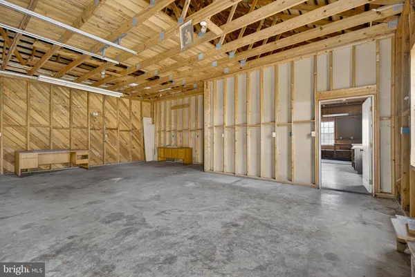 a view of a house with a yard and garage