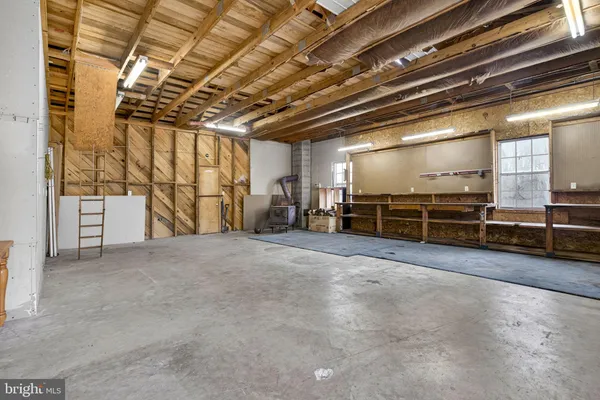 a view of an empty room with a garage