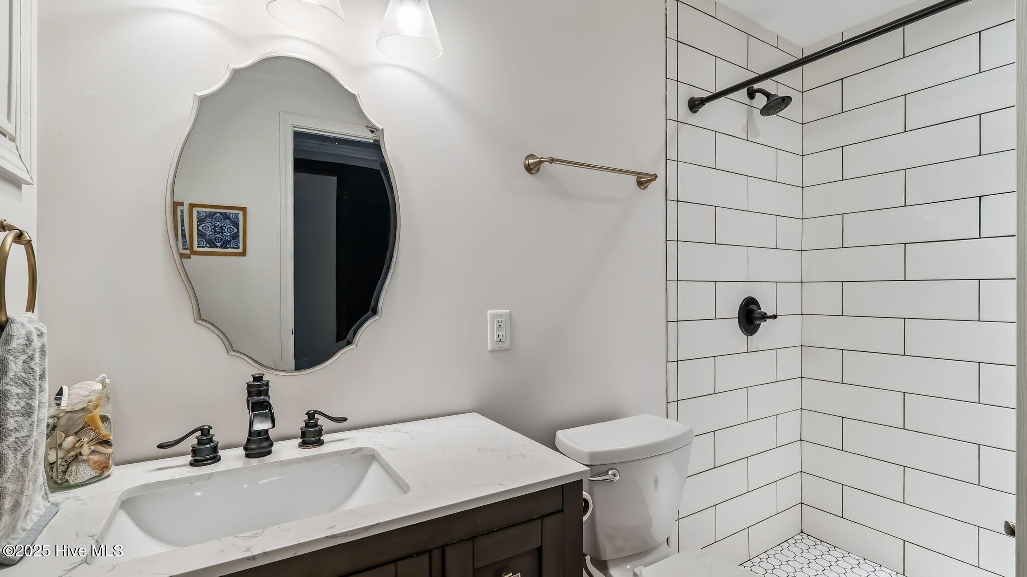 1336 McCaskill Road Carthage, NC 28327 - Photo 46 of 88 Upper level guest bathroom - luxuriously renovated with low to zero-entry custom shower