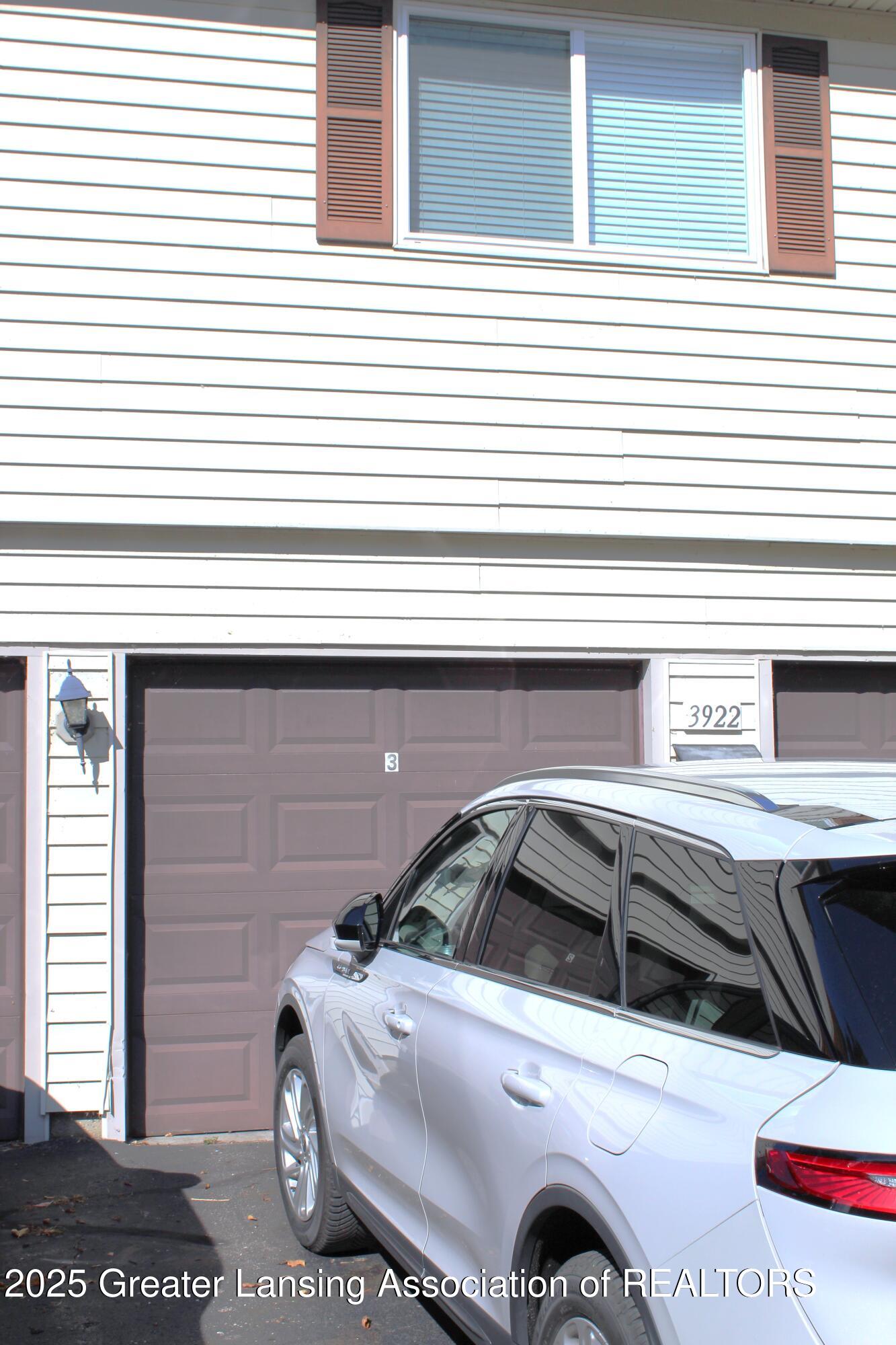 3922 Hunters Ridge Drive, Unit 3 Lansing, MI 48911 - Photo 32 of 44 ATTACHED GARAGE