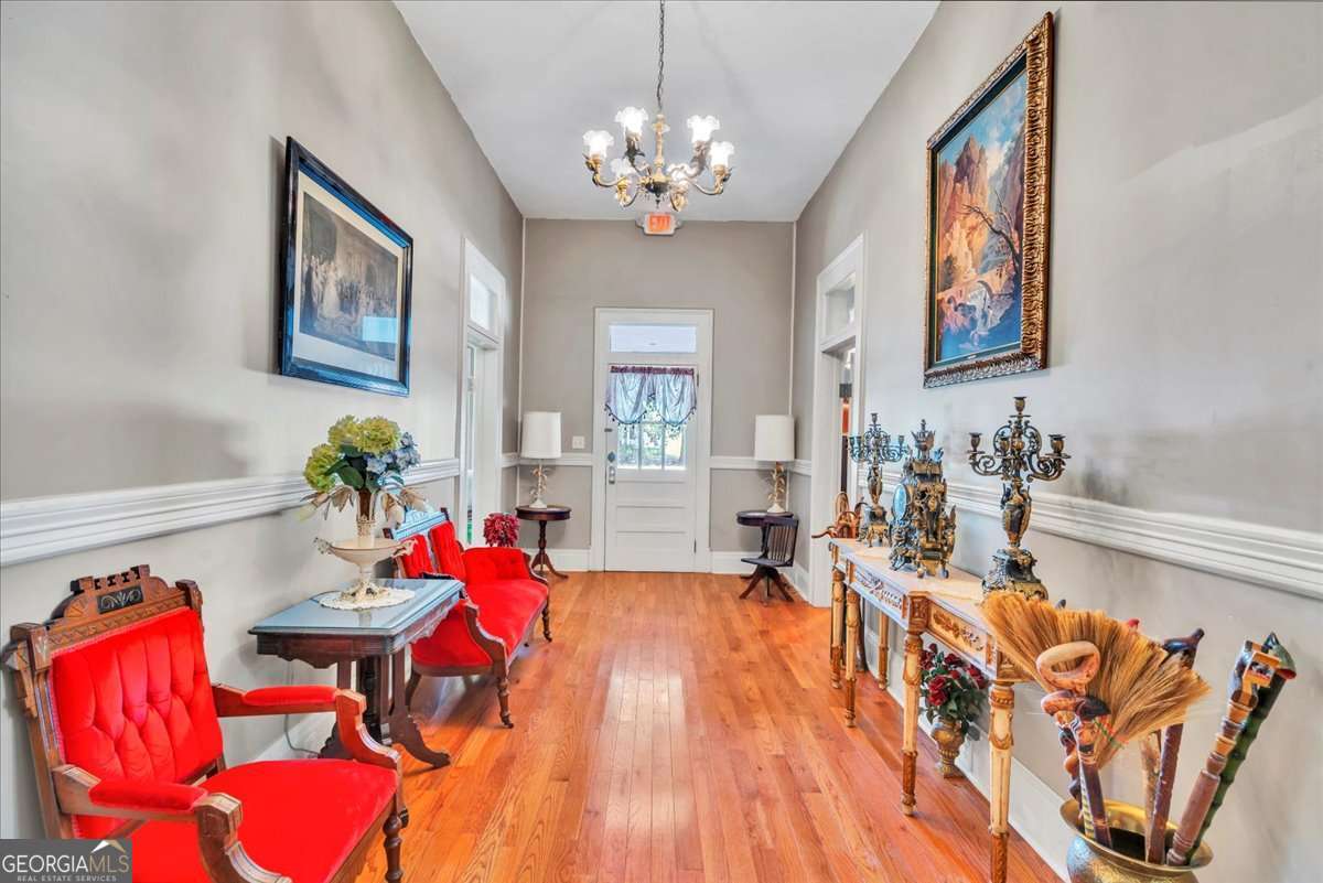 212 East Union Street Vienna, GA 31092 - Photo 8 of 62 a view of a dining room with furniture and chandelier