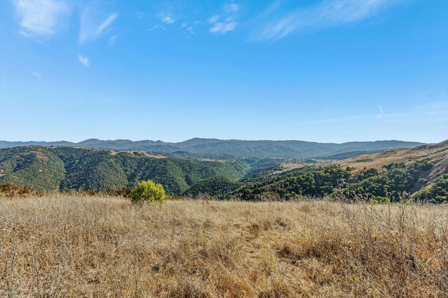 Adamo Adamo Ranch Carmel, CA 93923 - Photo 18 of 92 a view of a lake with mountains in the background
