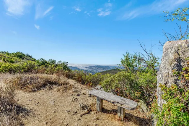 a view of mountain view with mountains in the background