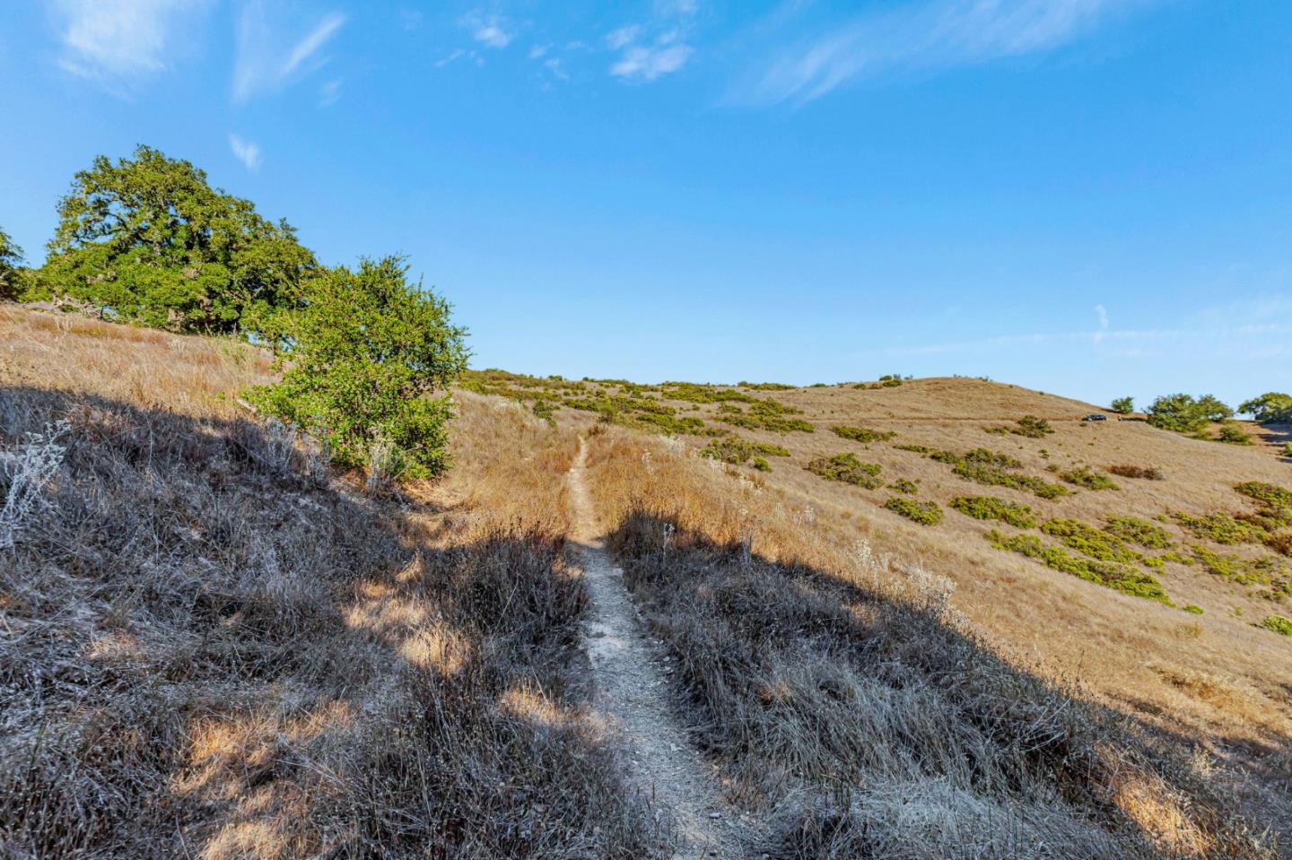 Adamo Adamo Ranch Carmel, CA 93923 - Photo 39 of 92 a view of a lake with a mountain in the background