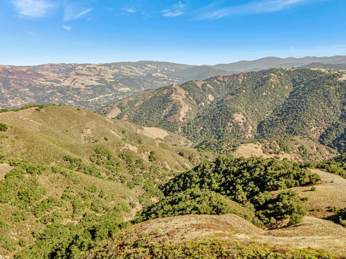 Adamo Adamo Ranch Carmel, CA 93923 - Photo 51 of 92 a view of a mountain range in a cloudy sky