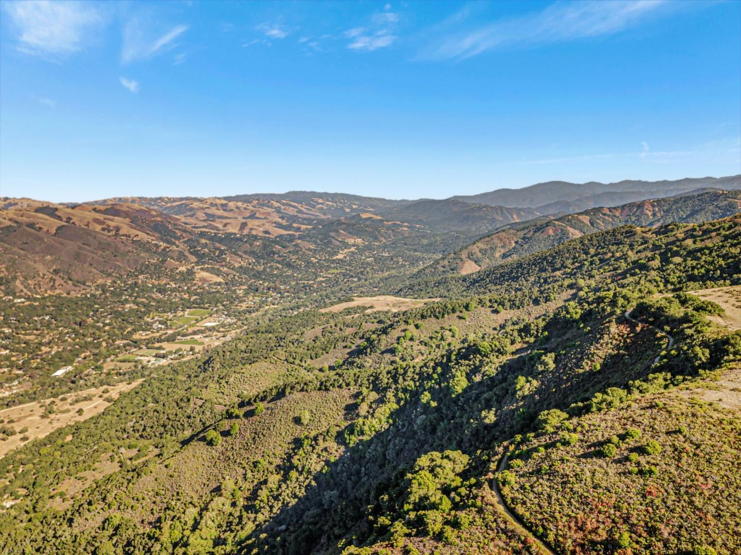 Adamo Adamo Ranch Carmel, CA 93923 - Photo 67 of 92 a view of a large mountain with mountains in the background