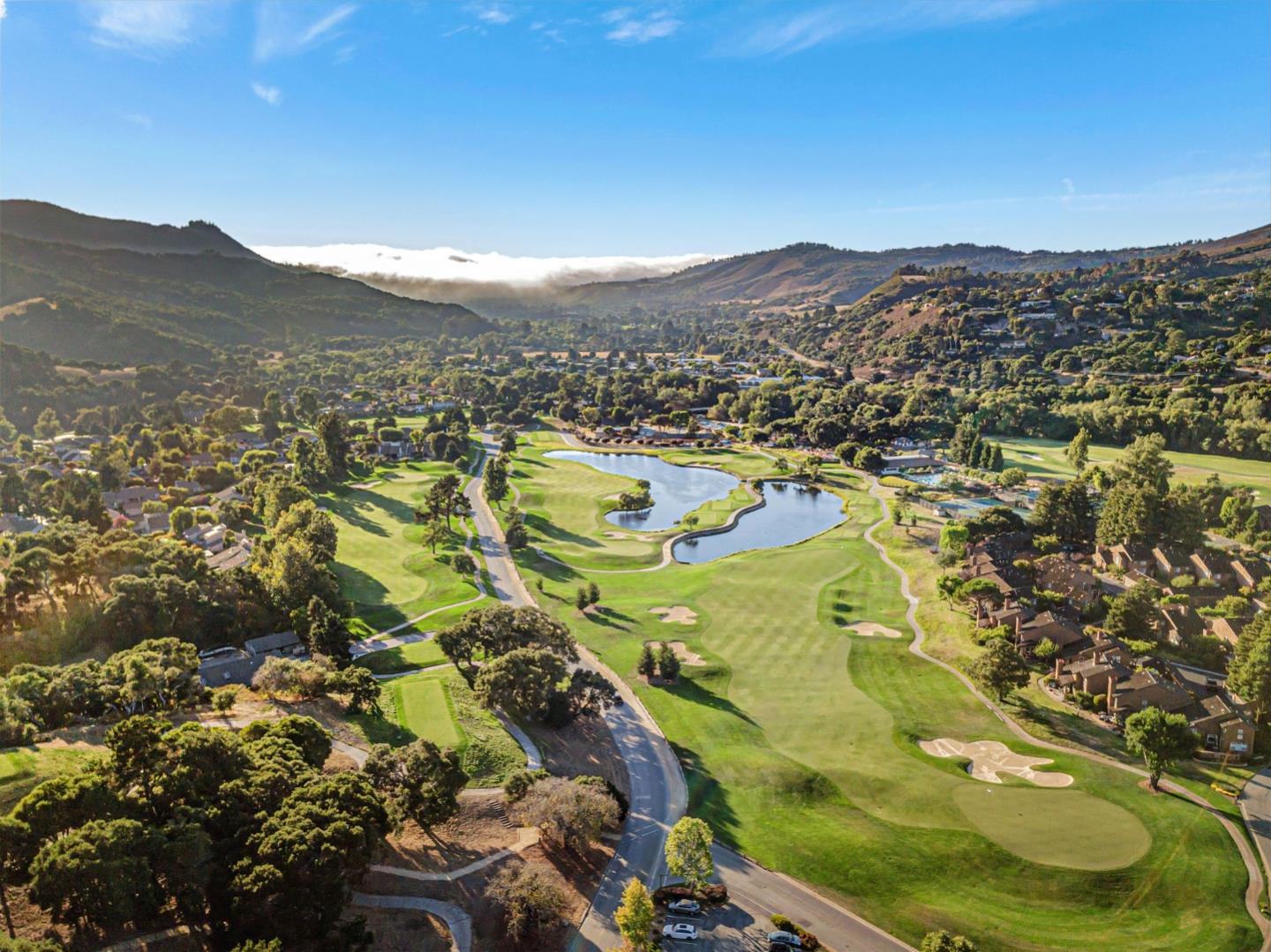 Adamo Adamo Ranch Carmel, CA 93923 - Photo 71 of 92 a view of a swimming pool with a mountain