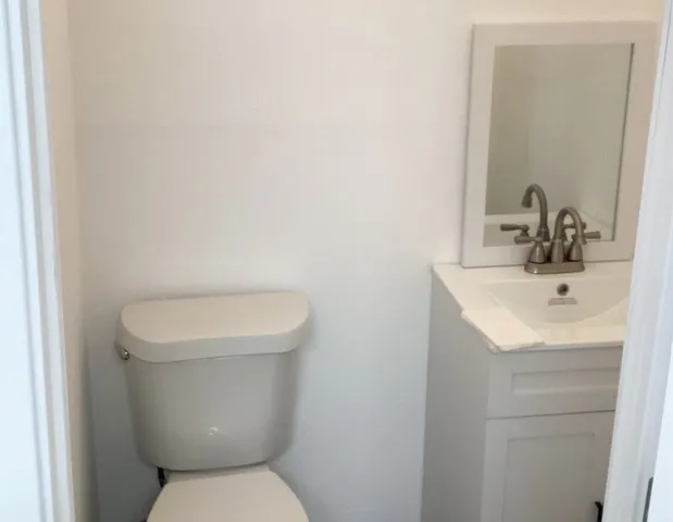 a view of a bathroom with tub