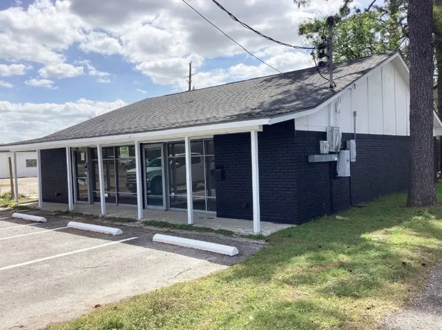 a house view with a garden space
