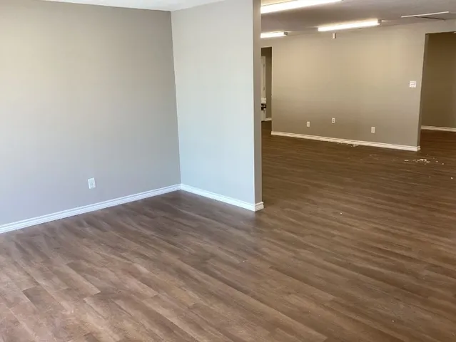a white toilet sitting next to a sink