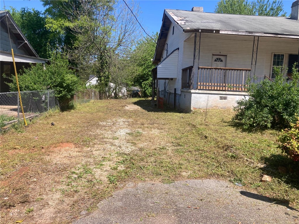 9 Humbert Street Seneca, SC 29678 - Photo 2 of 16 This property features a spacious yard and classic exterior, offering abundant potential for outdoor enjoyment.