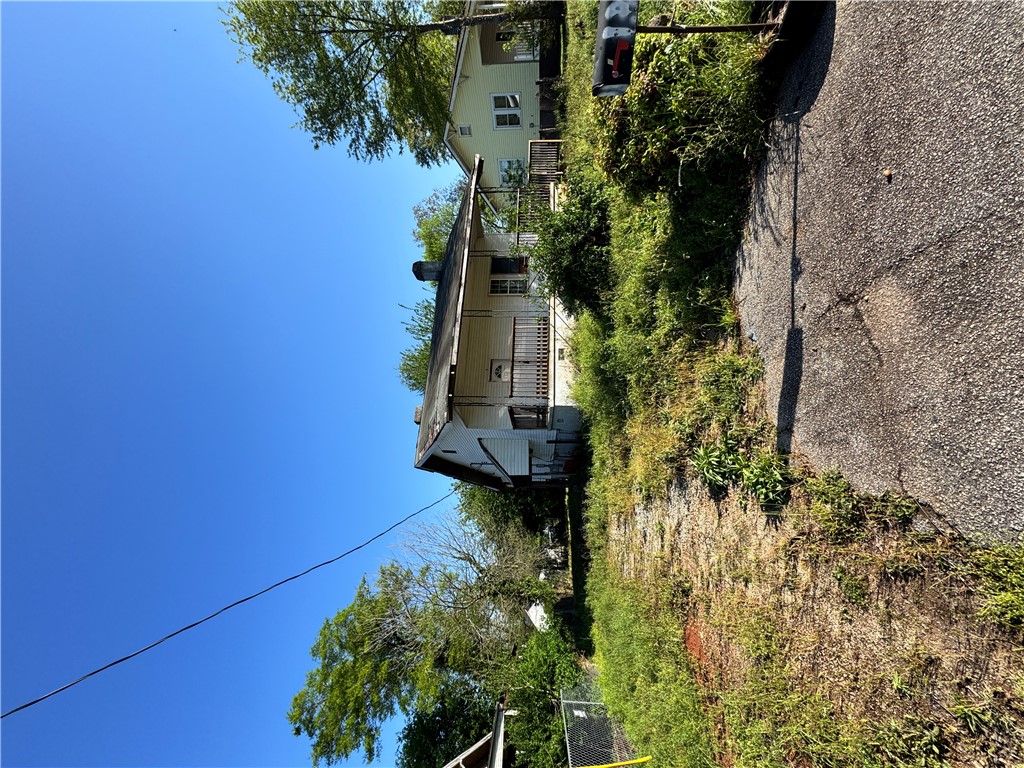 9 Humbert Street Seneca, SC 29678 - Photo 3 of 16 This charming residence presents an exciting opportunity for personalization and renovation.