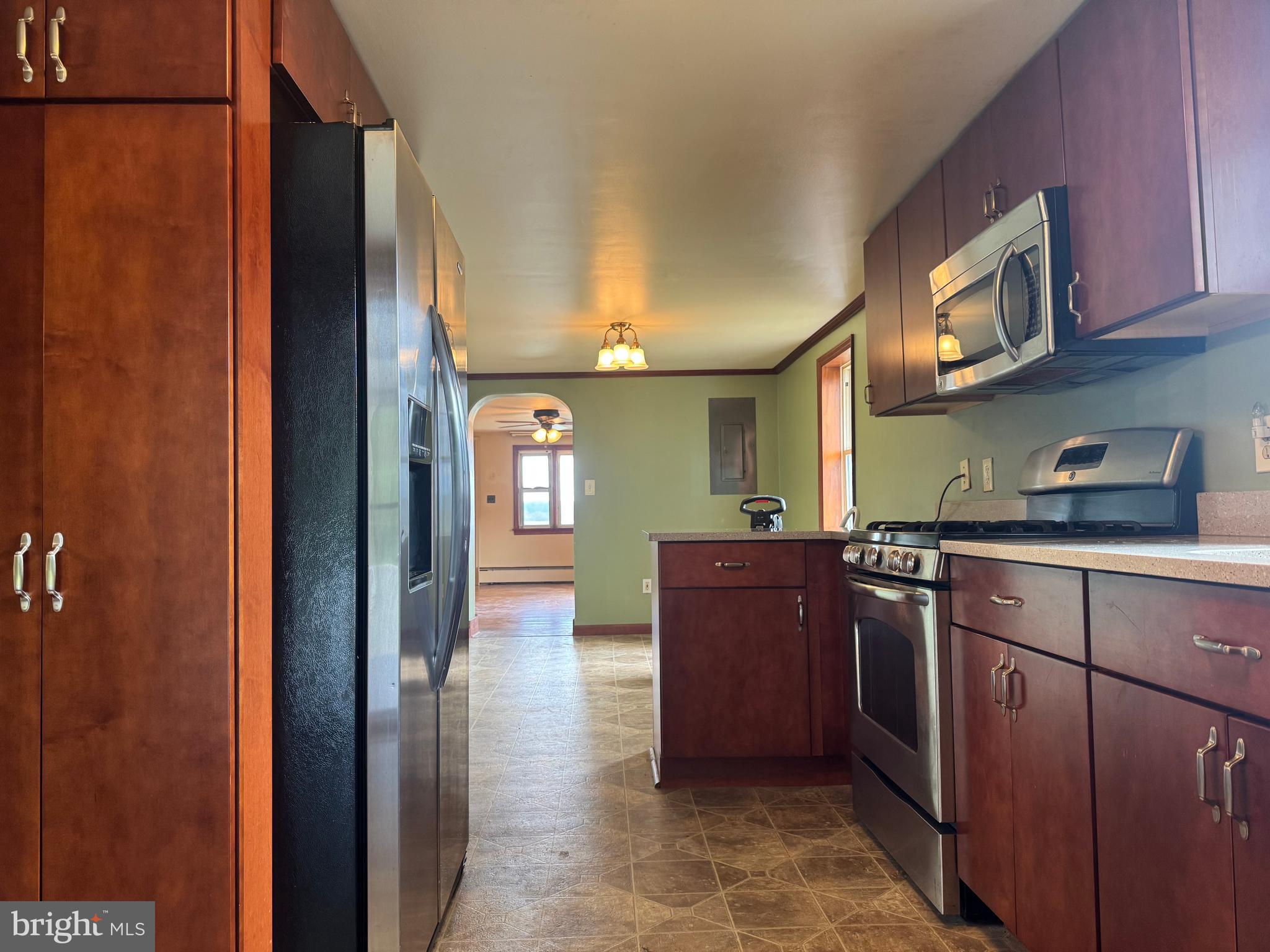 21626 New Freedom Road Freeland, MD 21053 - Photo 3 of 10 a kitchen with stainless steel appliances granite countertop a refrigerator and a sink
