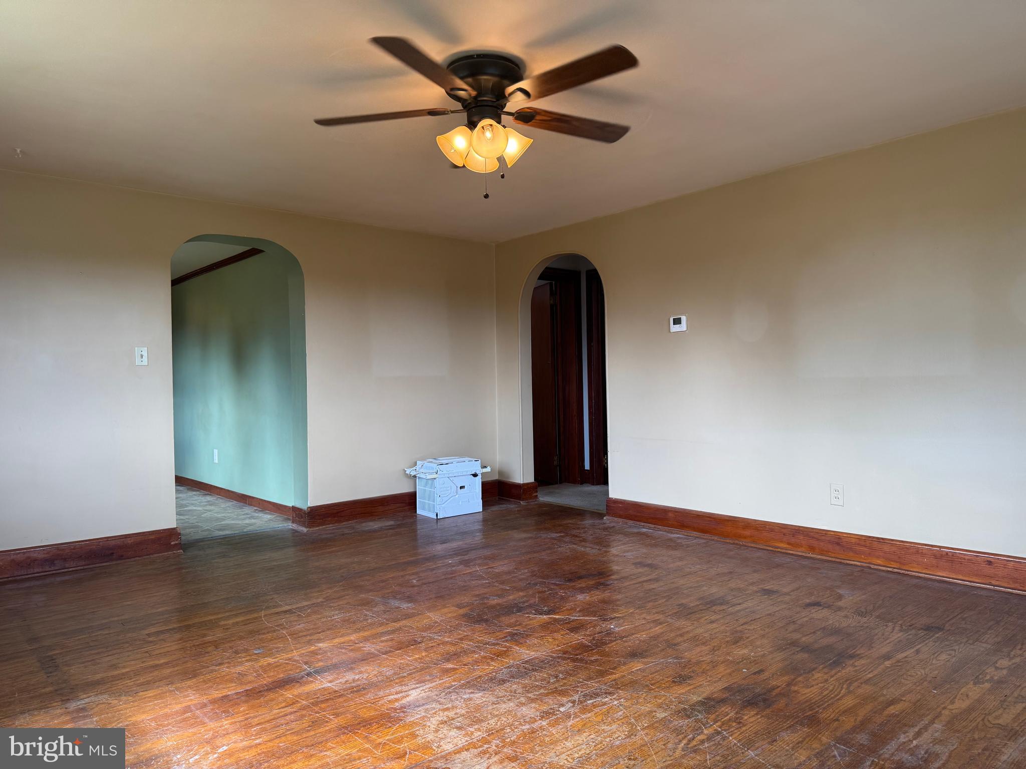 21626 New Freedom Road Freeland, MD 21053 - Photo 6 of 10 a view of an empty room with a chandelier fan