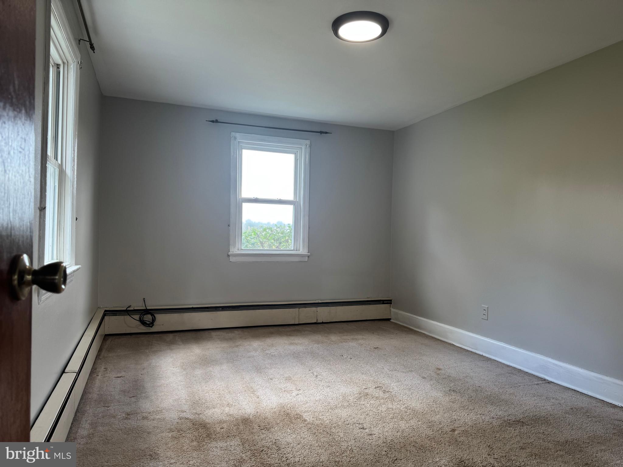21626 New Freedom Road Freeland, MD 21053 - Photo 8 of 10 an empty room with a window