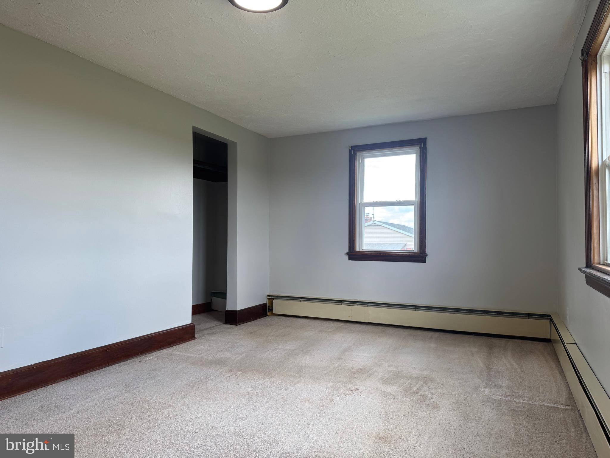 21626 New Freedom Road Freeland, MD 21053 - Photo 9 of 10 an empty room with windows