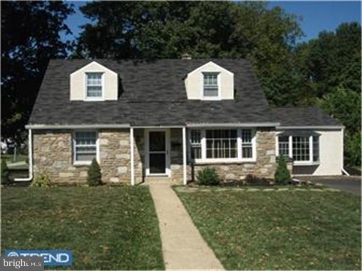 417 Suffolk Road Flourtown, PA 19031 - Photo 1 of 12 front view of a house with a yard