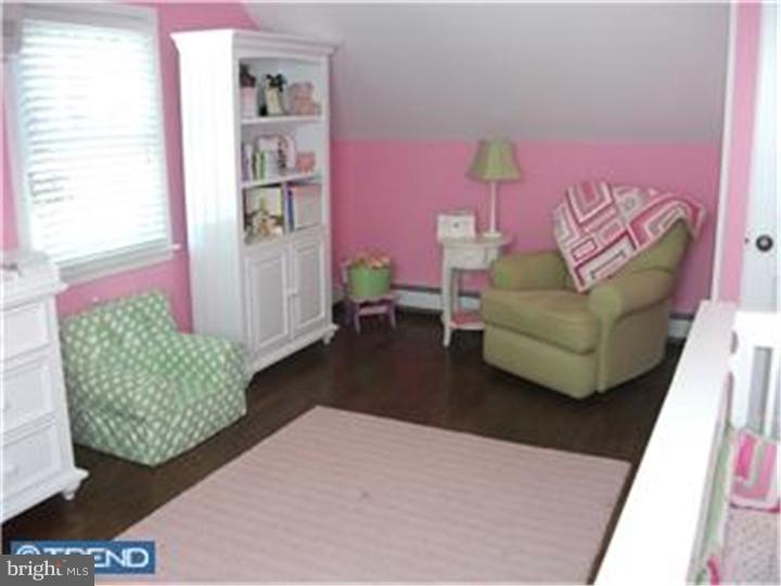 417 Suffolk Road Flourtown, PA 19031 - Photo 6 of 12 a living room with furniture and a rug