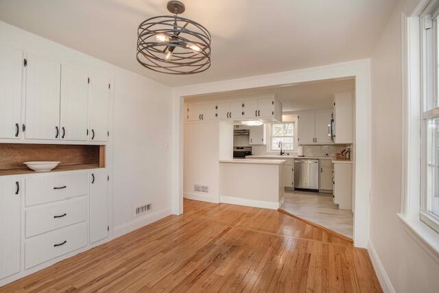 195 Prospect Street Ashland, MA 01721 - Photo 6 of 21 a kitchen with cabinets a sink and appliances