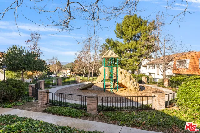 a view of a park with a houses