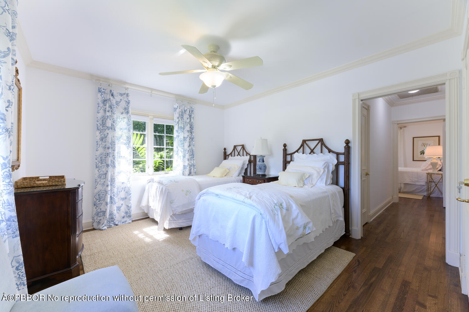 201 Pendleton Avenue Palm Beach, FL 33480 - Photo 12 of 22 a spacious bedroom with two beds and a chandelier
