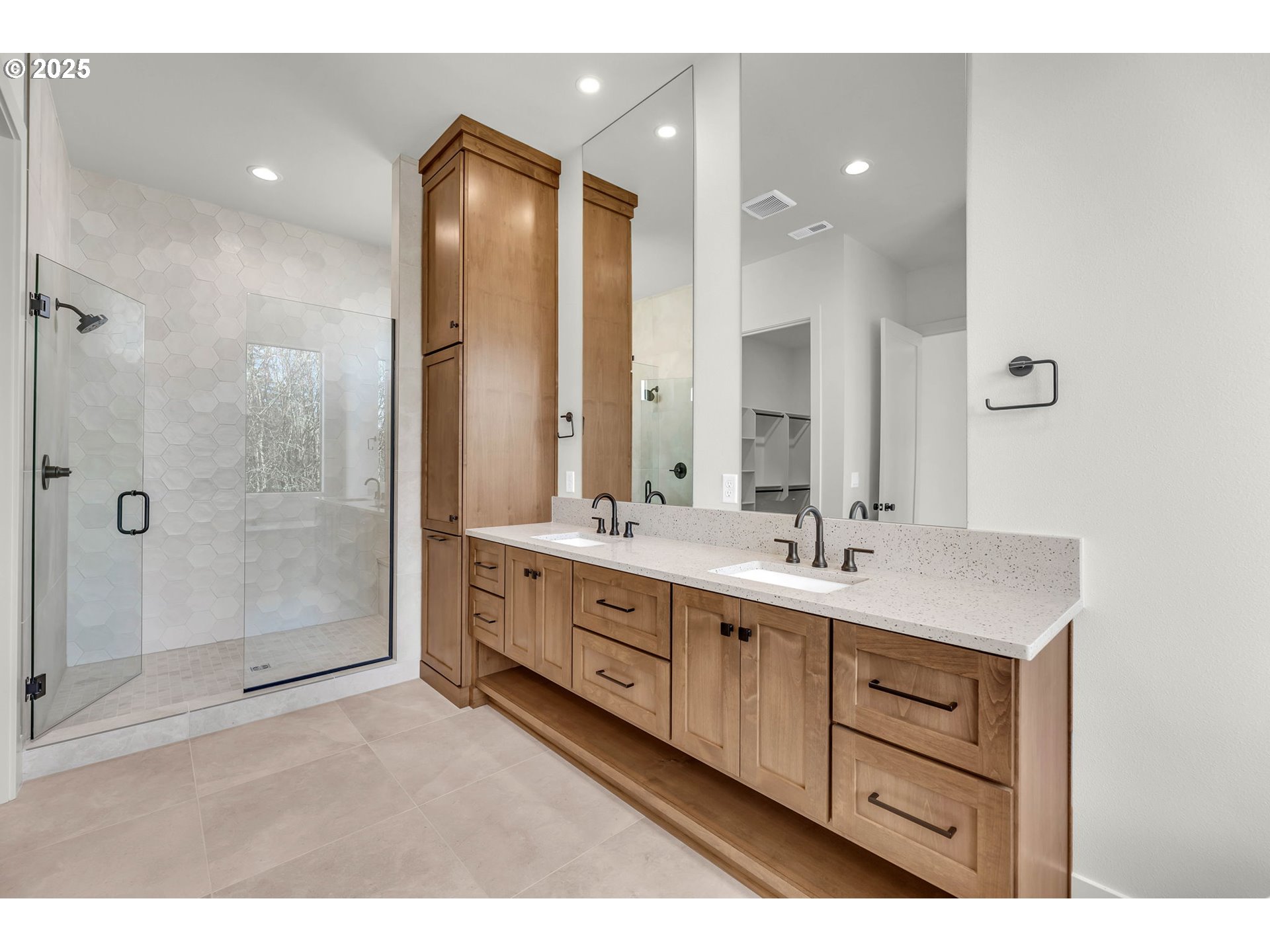 718 South 15th Court Ridgefield, WA 98642 - Photo 30 of 47 a spacious bathroom with a double vanity sink mirror and double
