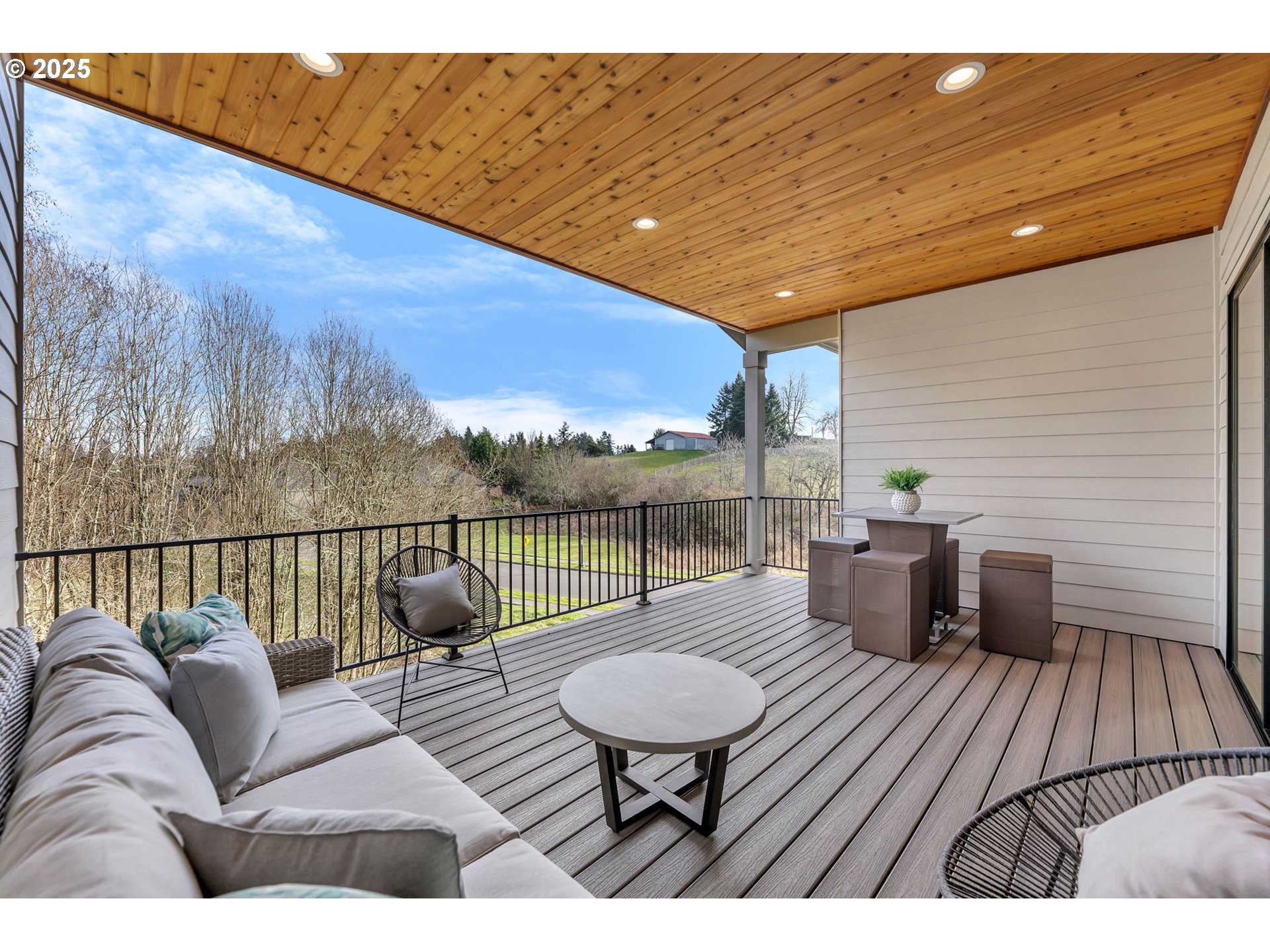 718 South 15th Court Ridgefield, WA 98642 - Photo 33 of 47 a view of a roof deck with couches